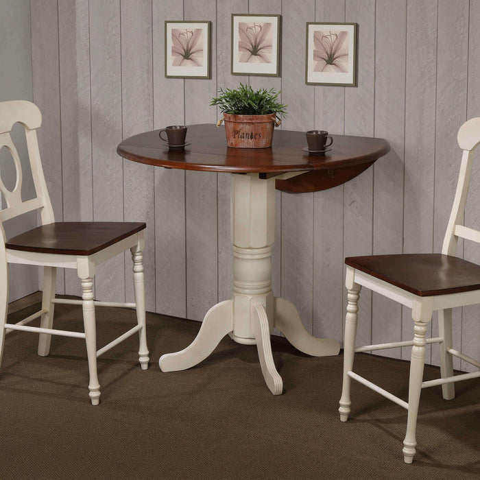 Sunset Trading Andrews 42" Round Extendable Drop Leaf Pub Table | Antique White with Chestnut Brown Top | Seats 4
