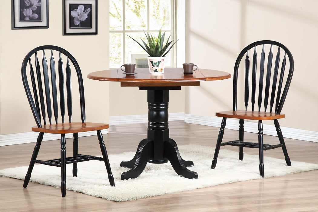 Sunset Trading Black Cherry Selections 42" Round Extendable Drop Leaf Dining Table | Antique Black and Cherry | Seats 4